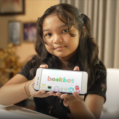 Girl using Bookbot on mobile