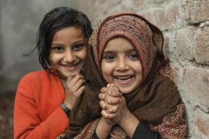 Anessa (right) and Rashida- two girls smiling 